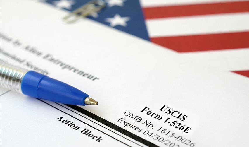A close-up of USCIS's Form I-526E for new investors who apply under the EB5 regional center program.