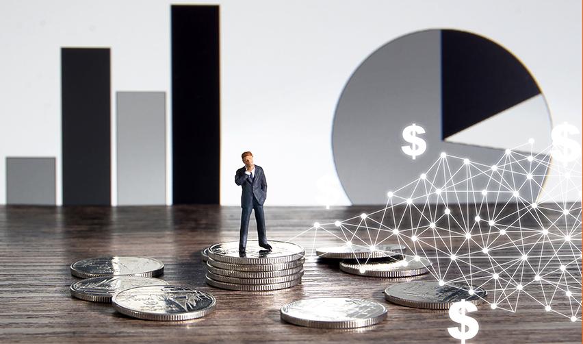 A figurine of an alien entrepreneur standing on a stack of coins, with financial icons and business graphs in the background.