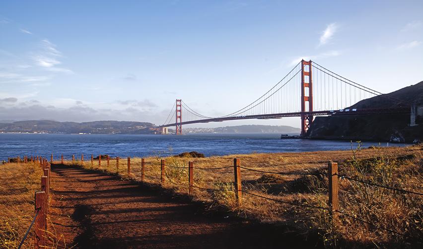 A wide angle photo of the San Francisco Bridge in California.