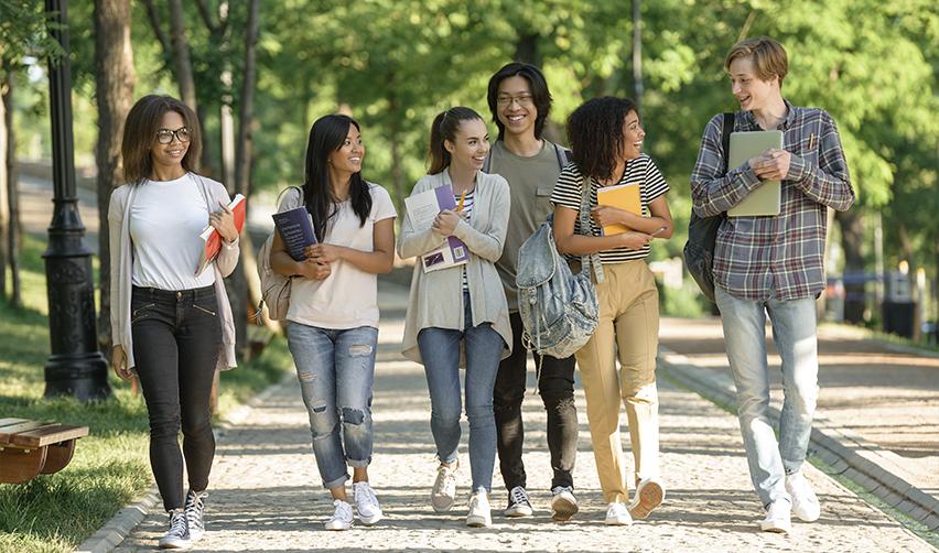 A group of international students enjoying the benefits of EB5 green cards.