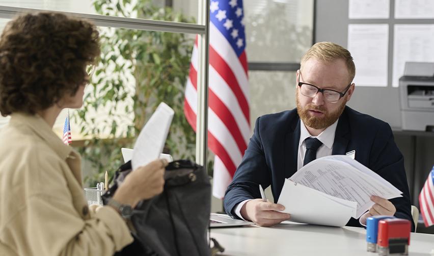 An EB5 dependent family member or principal investor going through a visa interview at a U.S. embassy or consulate.