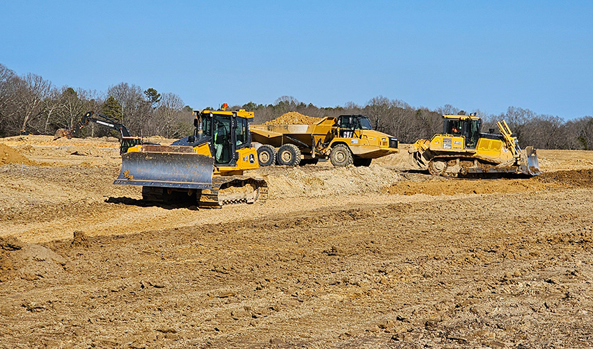 Several construction vehicles on a construction site