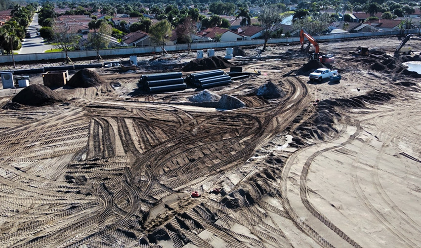 A construction site with lots of dirt and dirt