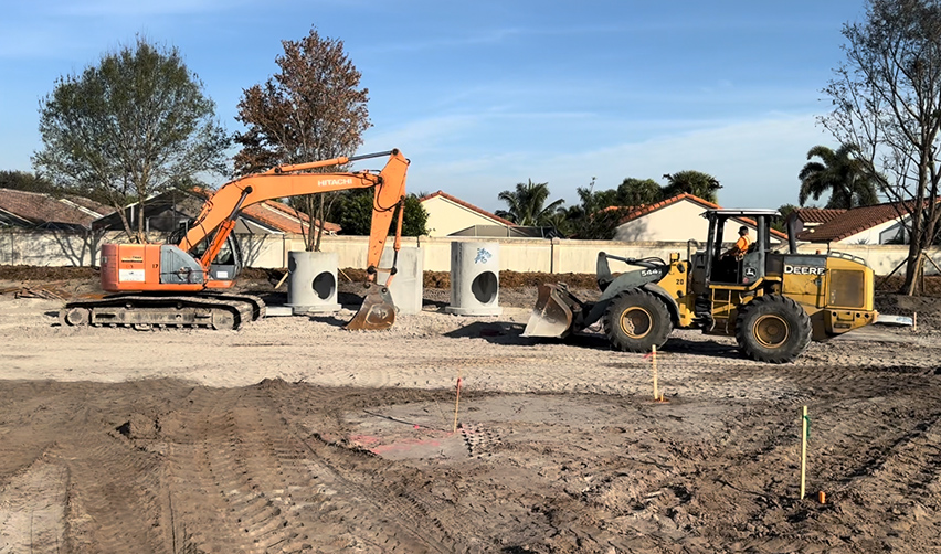 A construction site with a bulldozer and a bulldozer