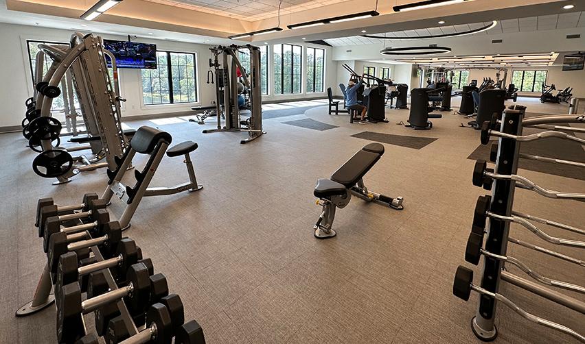 State-of-the-art fitness center at EB5AN and Kolter's Twin Lakes, Georgia EB-5 project, featuring EGYM's advanced strength training and workout machines designed for active adults seeking a healthier retirement.