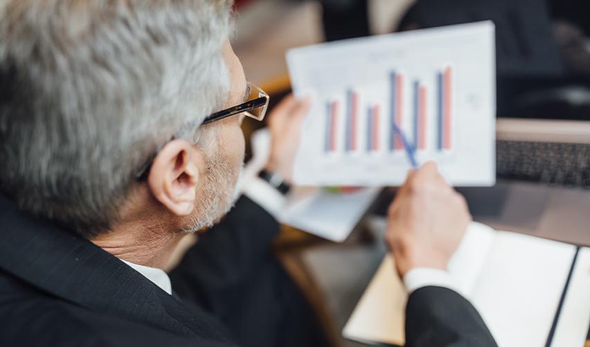 An experienced investment advisor or immigration lawyer analyzing EB5 investment strategies after an application denial.