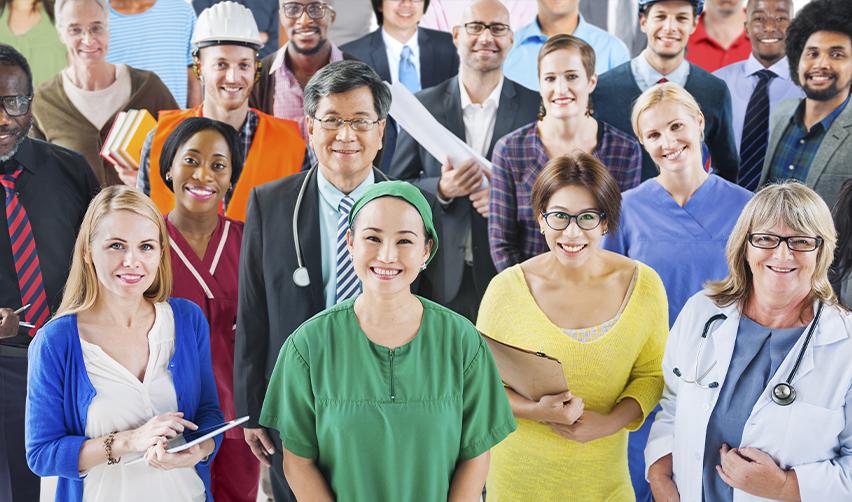 A diverse group of professionals—including doctors, engineers, nurses, and office workers—symbolizing the range of applicants eligible for U.S. employment-based immigrant visas.