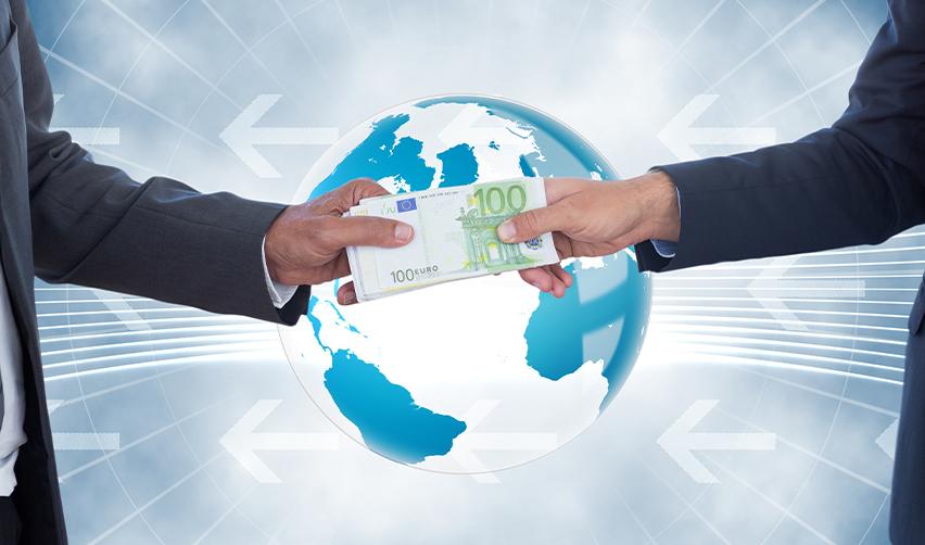 Two individuals in business suits exchanging euro banknotes in front of a digital globe, symbolizing international EB5 fund transfers and cross-border financial regulations.