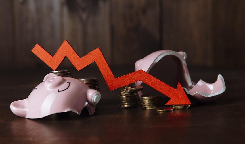 Falling stacks of coins and a red arrow reflecting reduced investor liquidity and the burden of higher taxes paid by skilled workers amid international trade wars and tariff-related inflation.