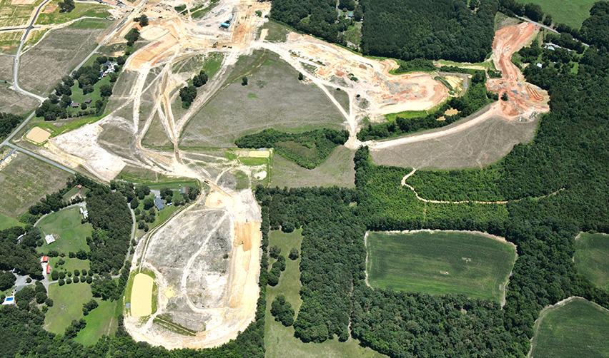 Aerial view of a land with many trees