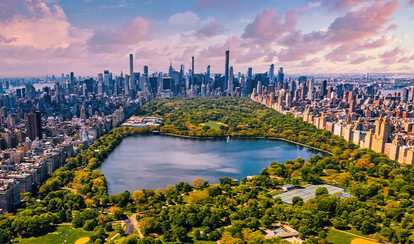 Aerial view of Central Park and Manhattan skyline in New York City, highlighting top urban destinations for EB5 investors.