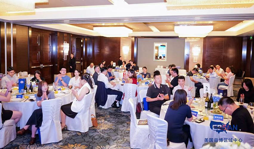 A group of people sitting at tables in a room