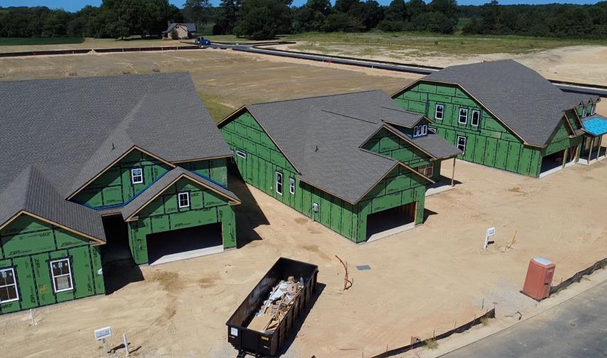 A group of houses under construction
