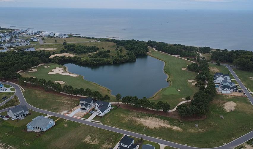 Aerial view of the rural Bay Creek EB5 project with senior loan, showing community development and EB5 real estate progress.