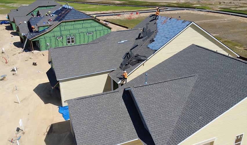 A group of houses with a roof