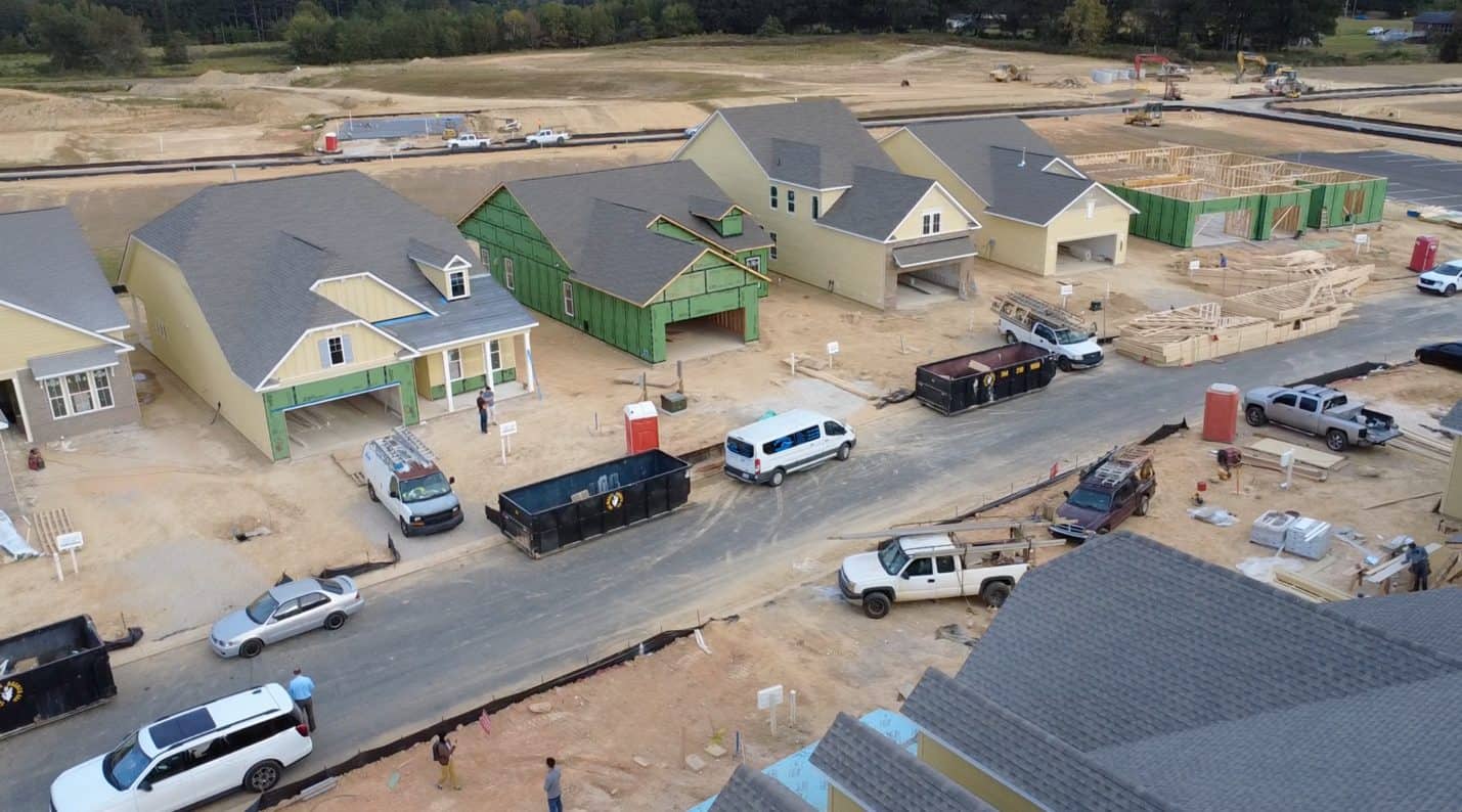 A group of houses in a construction site