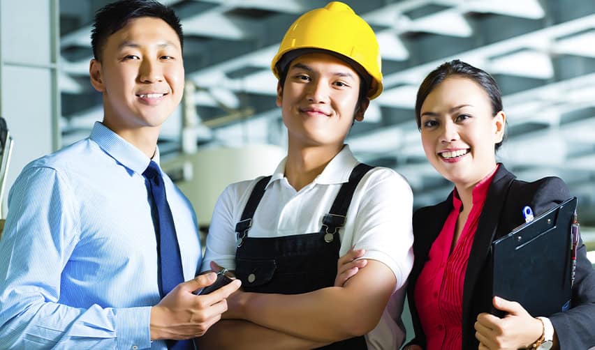 A group of skilled workers and professionals standing together, representing career-based immigration options alongside the EB5 path for J1 visa holders.