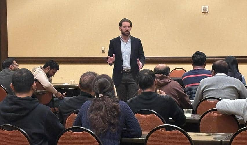 A close view of Jordan Lawrence addressing EB5 investors during the educational portion of the event.