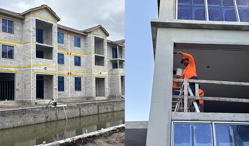 Exterior construction progress at Boynton Beach Multifamily with façade work underway and crews performing detailed exterior finishing as part of the EB5 funded development.