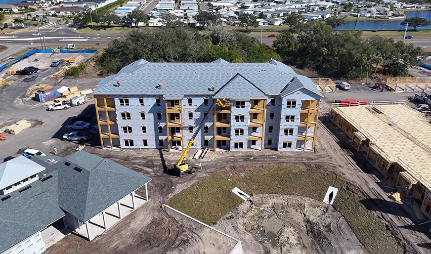 Close aerial of Terra Ceia Multifamily apartment building with roofing completed as EB5 construction moves into vertical phase.